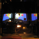 A radio tech booth in a glass enclosure