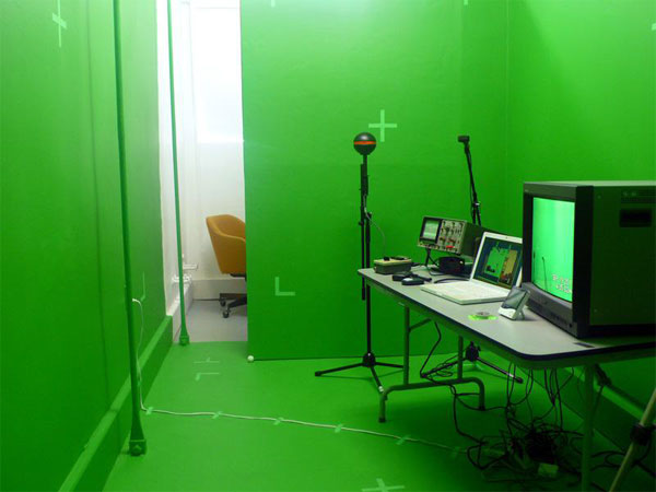 A green room with a tech set up and another room inside (150x150)