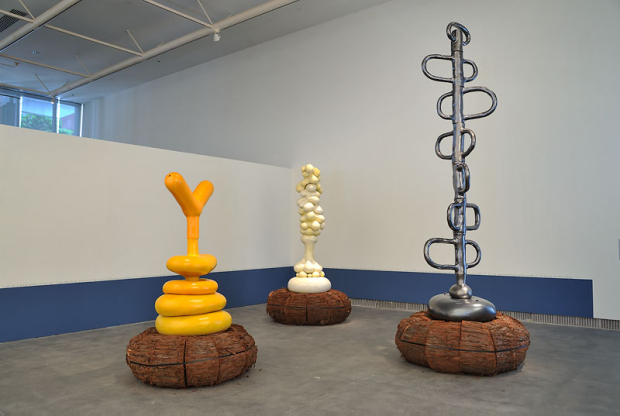 A yellow, white, and black statue/art installation (650x470)