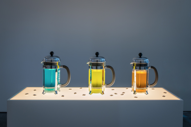 Three French press with colored liquid inside (650x470)