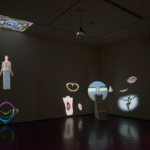 A dark room with art installation made of light projections (650x470)
